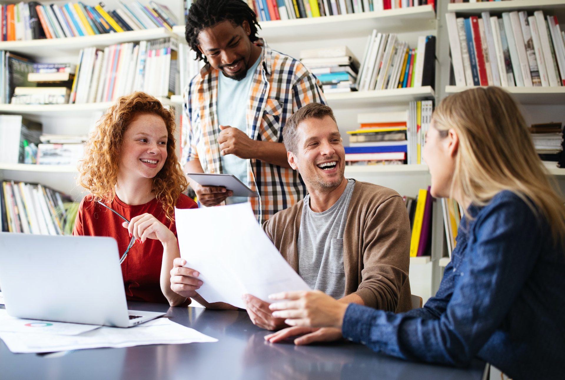 Successful company with happy employees in modern office